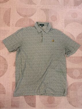 Masters Classics Green Sign Post Pattern Polo with Yellow Logo
